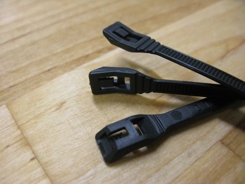 Close up of Cobra low profile zip ties | The patented design is safer and stronger than the competition